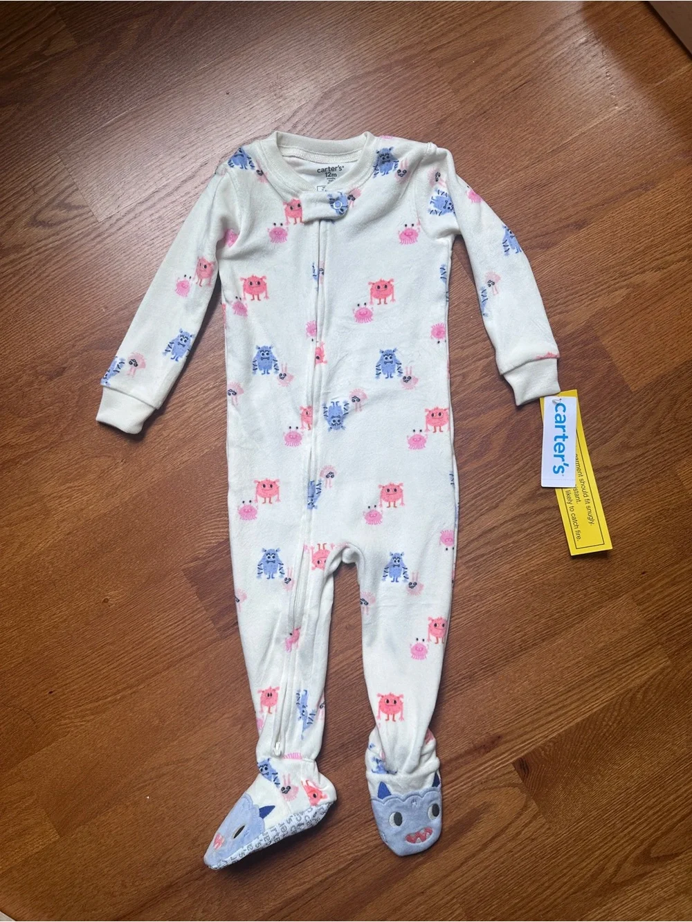 Carter's Cream Footed One-Piece Pajamas with Pink and Blue Monster Print